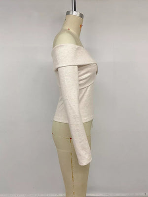 Off-the-shoulder top in light heathered knit with long sleeves and a draped neckline.
