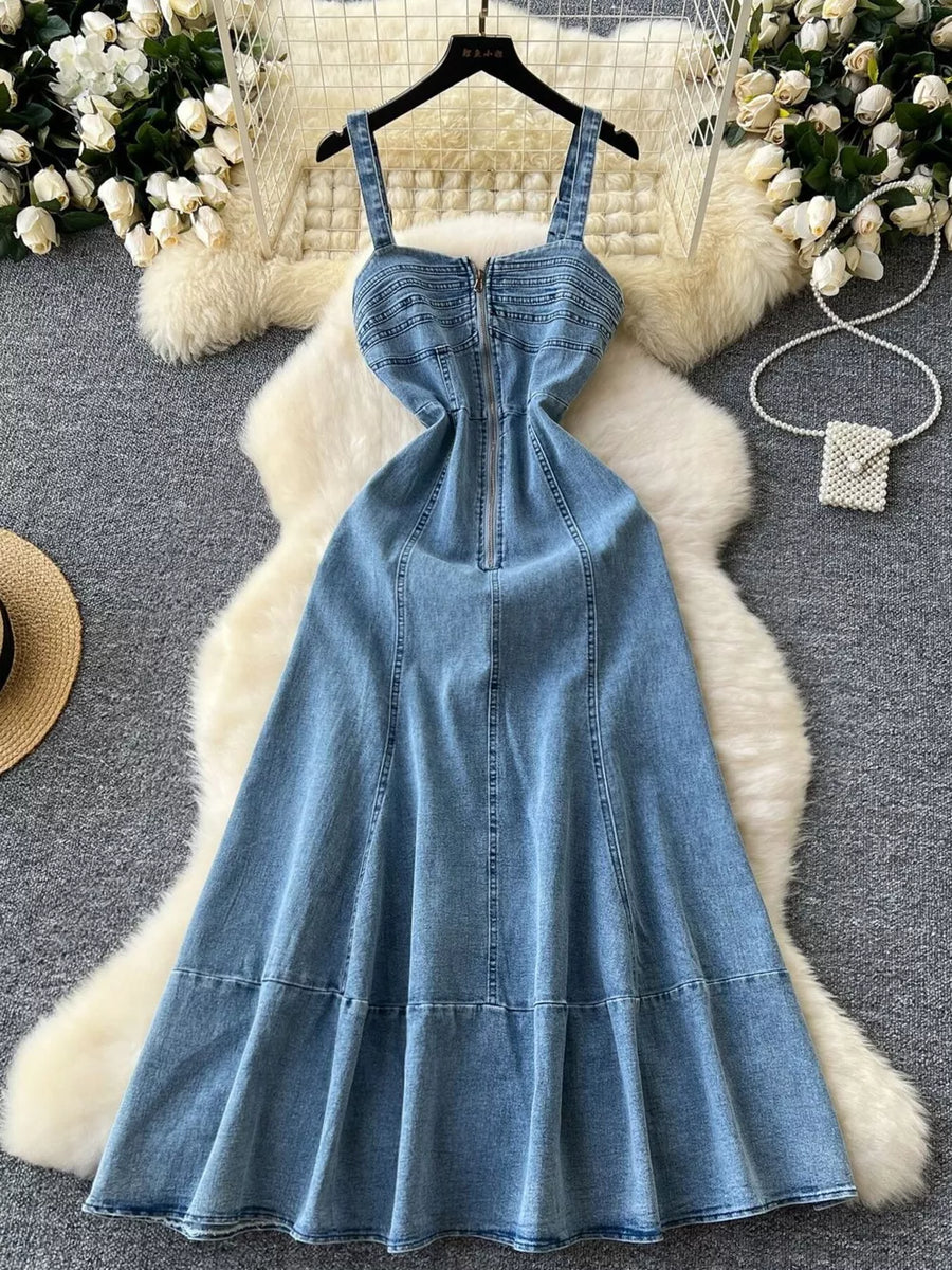 Blue denim A-line midi dress with zipper detail and tiered skirt