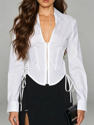 blouse in white featuring ruched and fitted fit