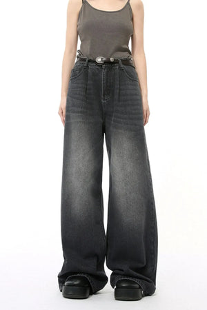 Oversized black denim palazzo jeans with subtle wash and wide leg