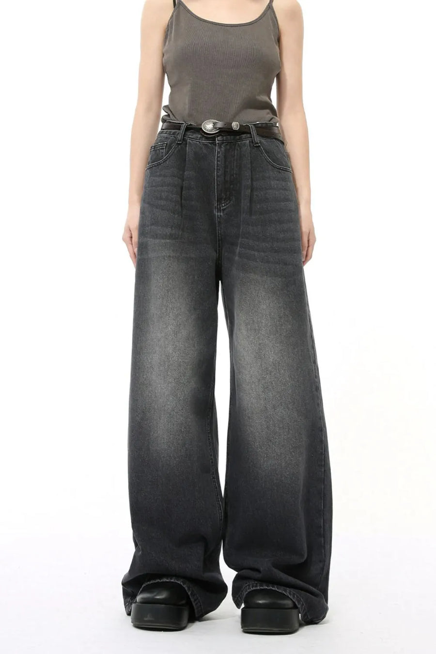 Oversized black denim palazzo jeans with subtle wash and wide leg