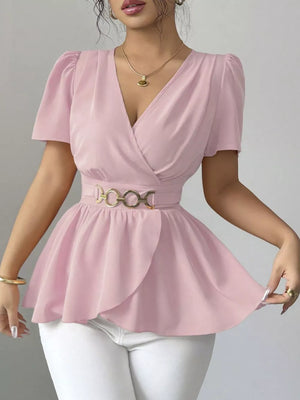 Pink surplice blouse with short puff sleeves, belted waist, and peplum hem.