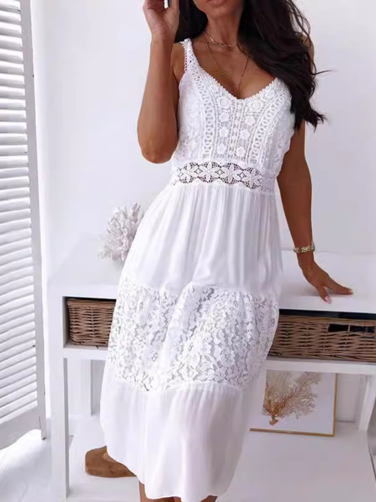 White lace trim V-neck cami dress with tiered skirt and crochet detail.