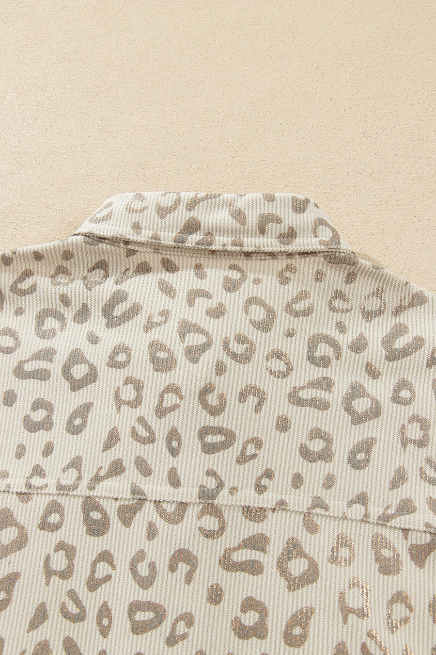 tan jacket with button-front and leopard-print
