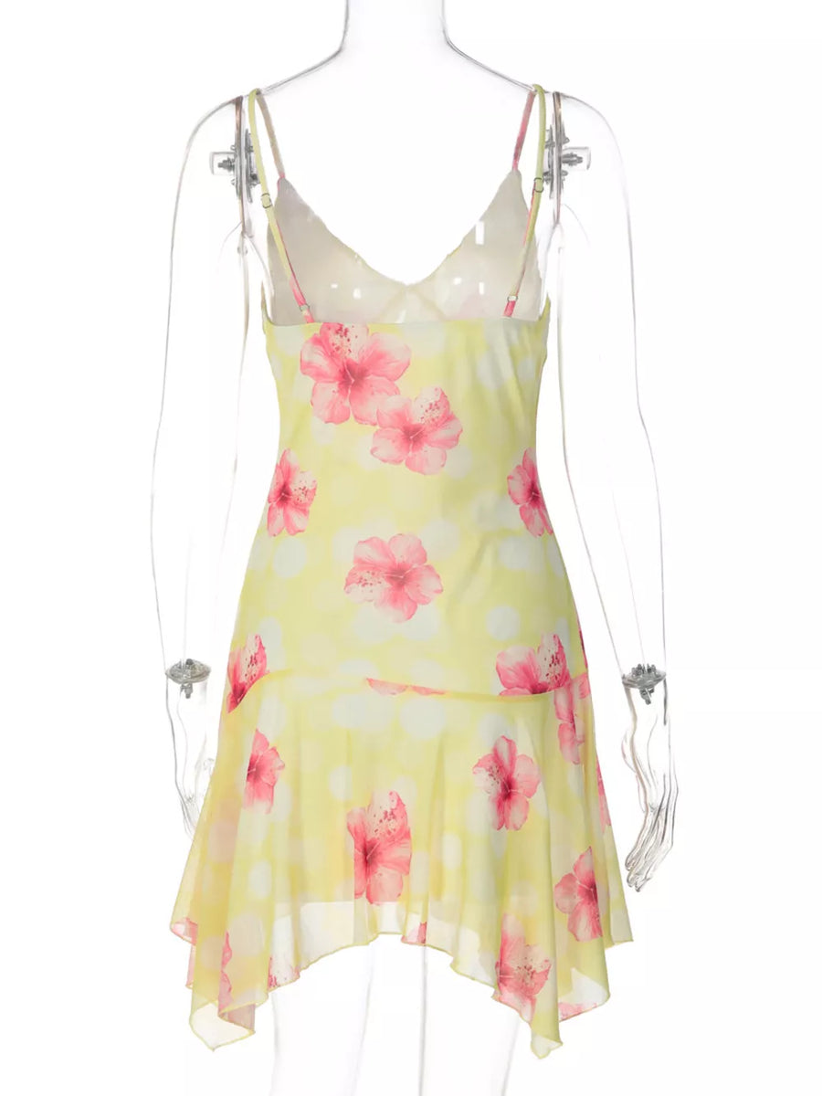 Yellow floral asymmetrical mini dress with ruffled hem and V-neck.