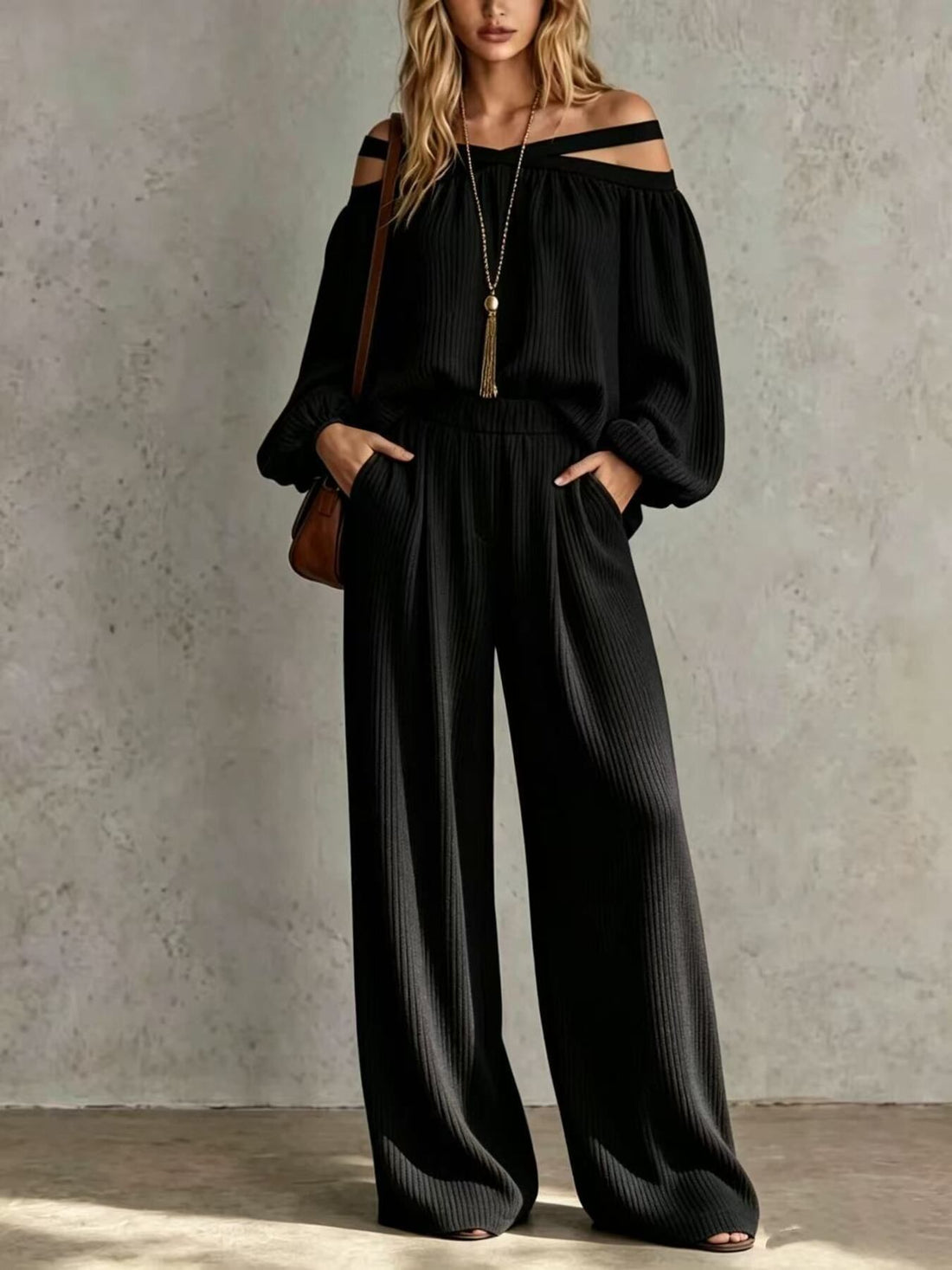 Black two-piece set with crisscross and long sleeve