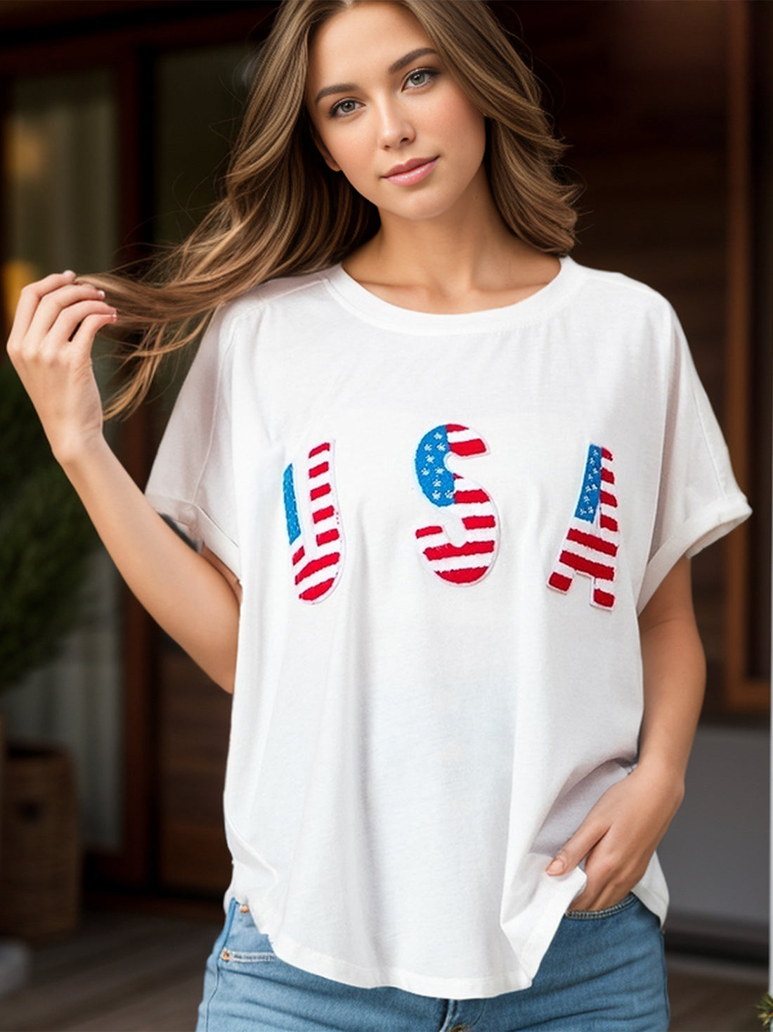 White t-shirt with embroidered USA flag letters, crew neck, short sleeves