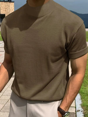 Rolled sleeve mock neck knit tee in Matcha Green with a textured finish.