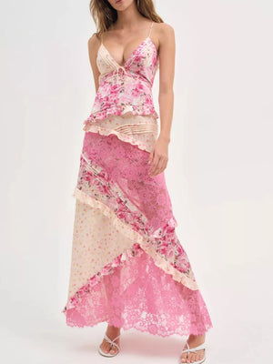 Pink floral lace maxi dress with ruffles and tiered skirt.