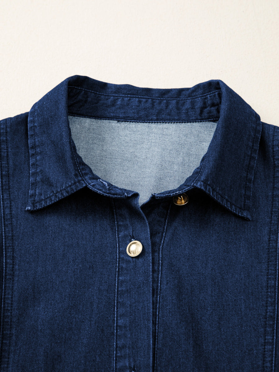 Button-down midi denim dress with gold buttons and collar detail.