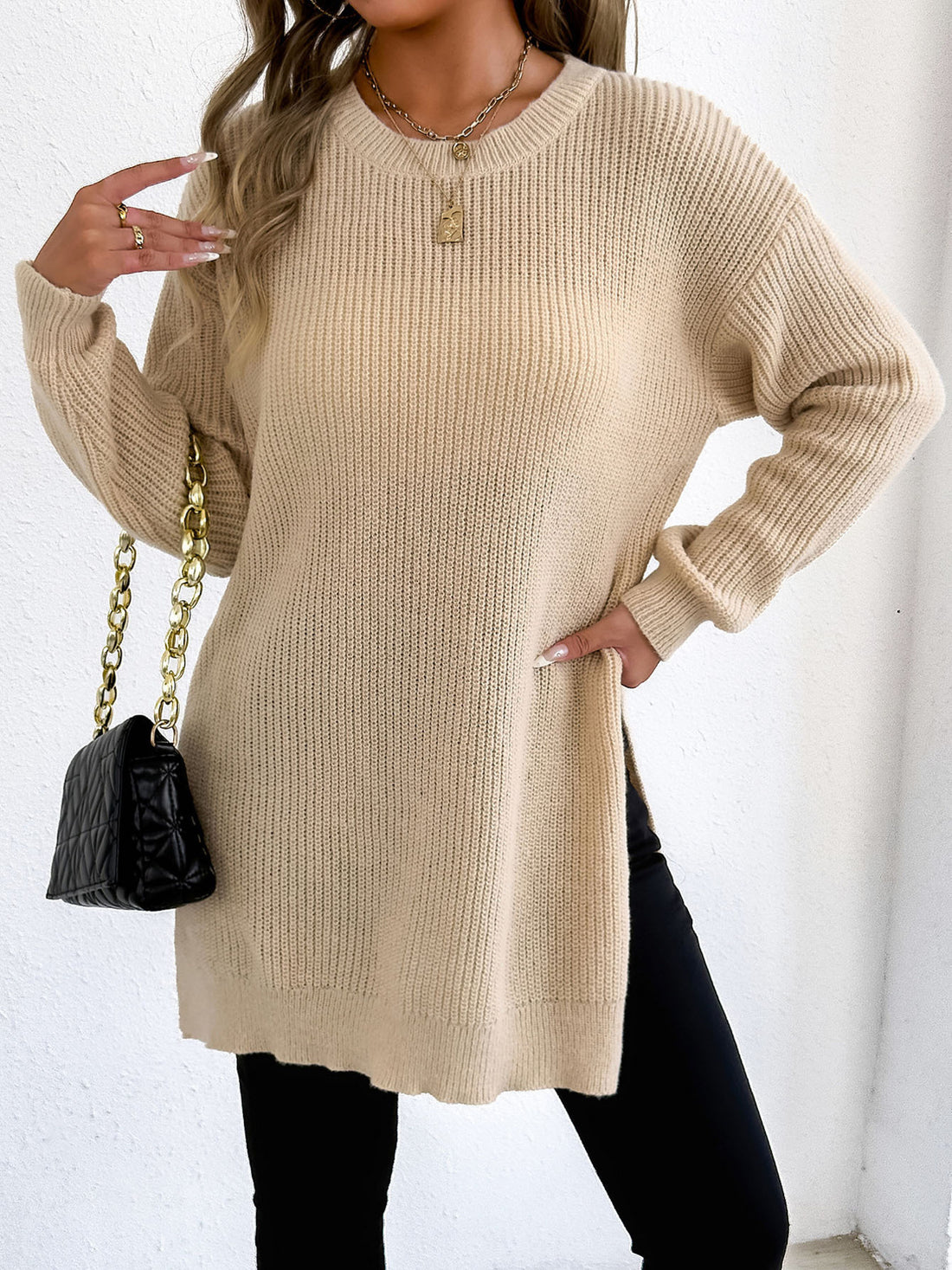 pullover sweater in light beige featuring ribbed and relaxed fit