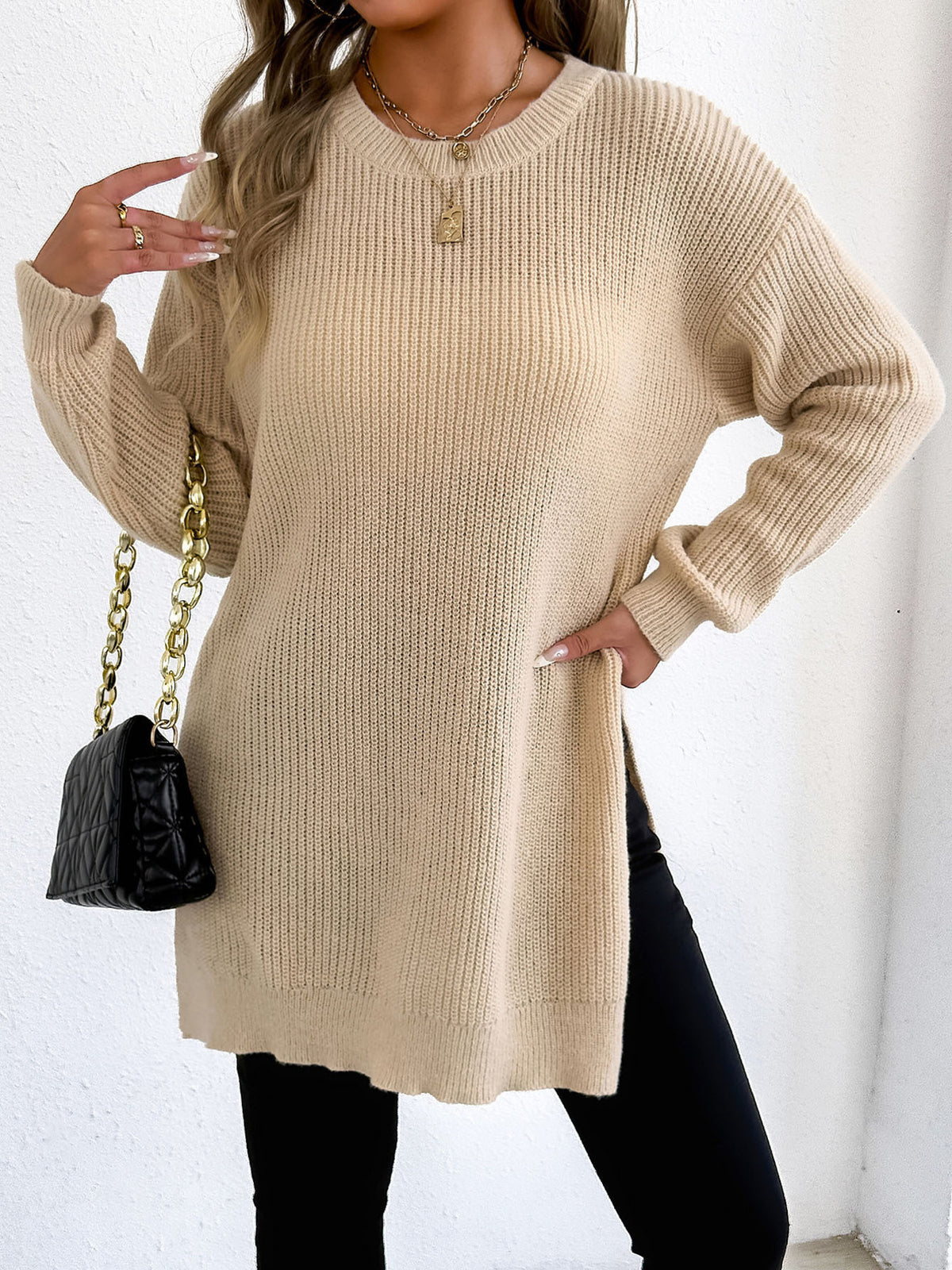 pullover sweater in light beige featuring ribbed and relaxed fit