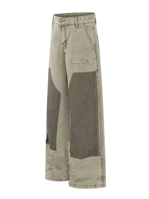 Two-tone wide-leg cargo pants in khaki and green with distressed details and patchwork.