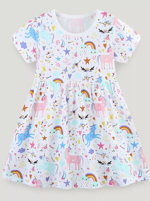 White cotton toddler dress with a colorful unicorn and rainbow print, short sleeves, and gathered waist.
