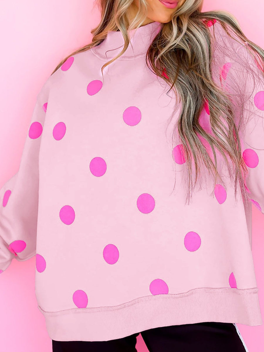magenta sweatshirt featuring mock neck and polka-dot