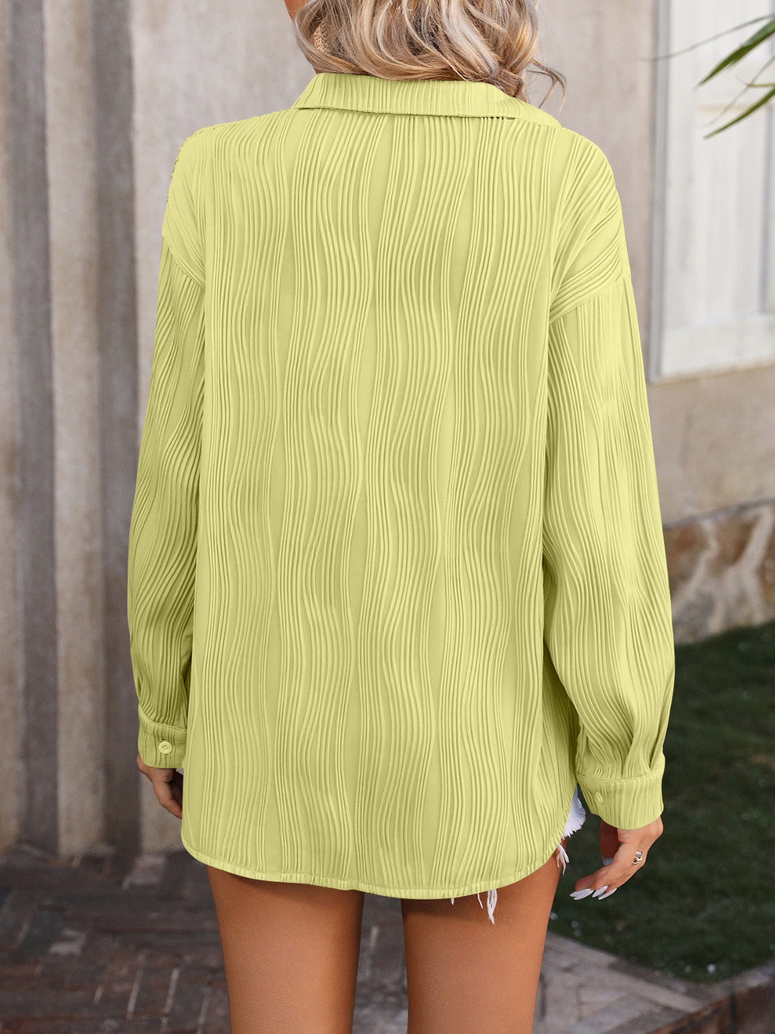 Textured pleat oversized button-down shirt in Yellow-Green with long sleeves and a collared neckline.