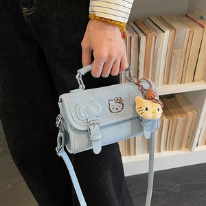light blue crossbody bag with flap closure and N/A