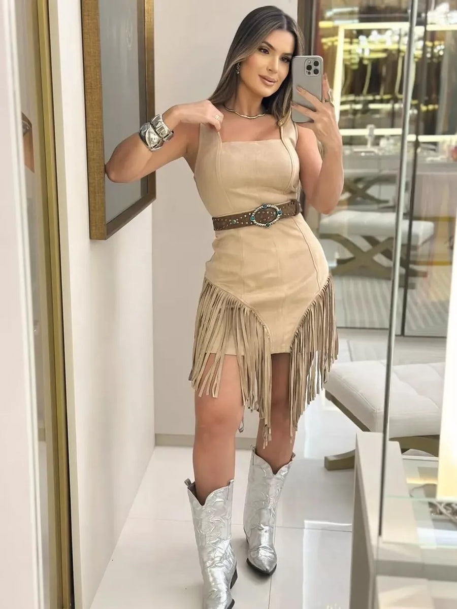 Asymmetrical fringed mini dress in tan cotton blend with square neckline and sleeveless cut.