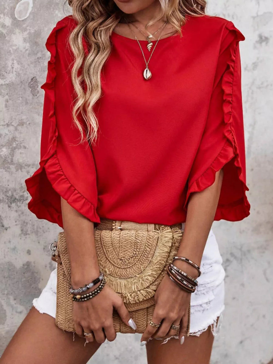 Red ruffled sleeve blouse with button detail and round neckline.