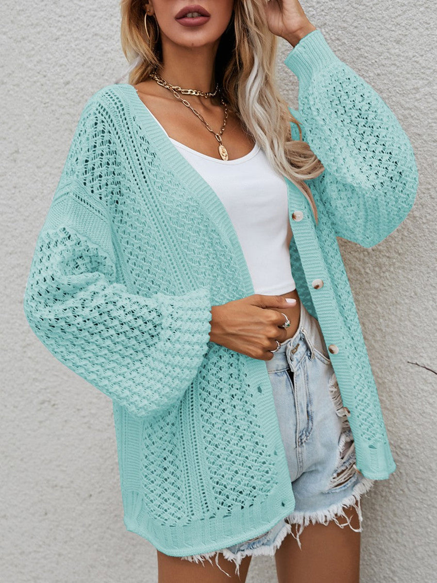 Open-knit button-down cardigan in turquoise with balloon sleeves and a relaxed fit.