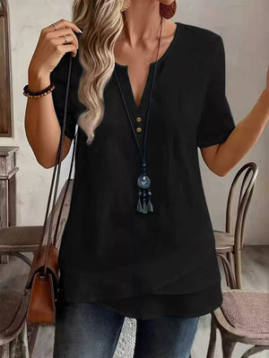 blouse in black featuring notched neckline and relaxed fit
