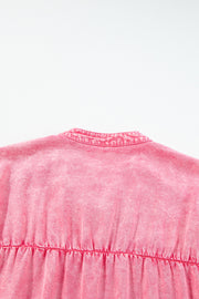 Acid wash ruffle shirt dress in dusty pink with a buttoned collar detail.
