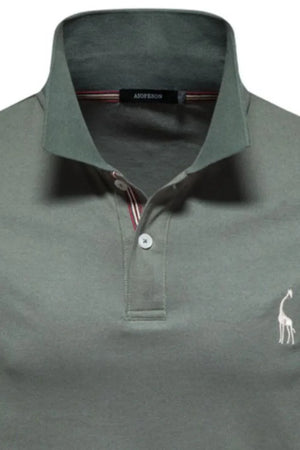 Moss piqué polo shirt with giraffe embroidery and striped collar detail.