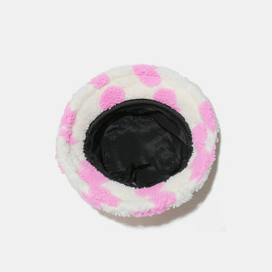 Pink polka dot fuzzy sherpa bucket hat with black lining