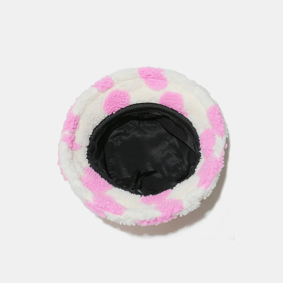 Pink polka dot fuzzy sherpa bucket hat with black lining