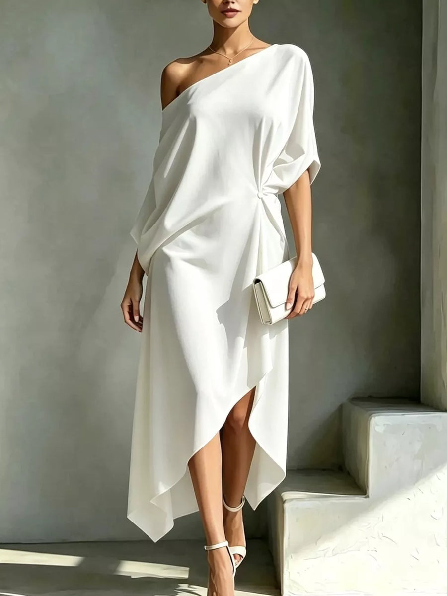 White one-shoulder midi dress with draped detail and asymmetrical hem