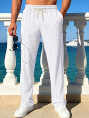 pants in white featuring drawstring waist and relaxed fit