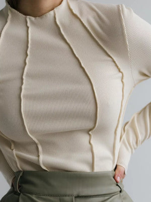 Apricot ribbed mock neck t-shirt with deconstructed seam details