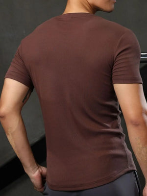 Men's dark brown ribbed crewneck tee with short sleeves.