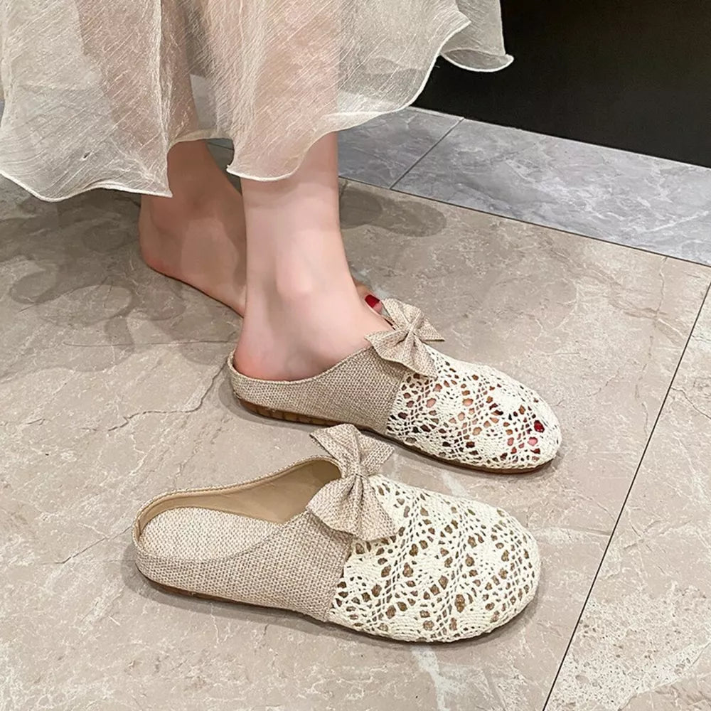 cream flats featuring round toe and crochet