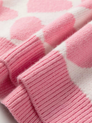 Charming Heart Pattern Knit Sweater in blush pink and white acrylic, featuring ribbed cuffs and hem detail.