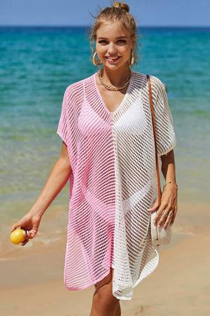 Ombre crochet beach cover-up in pink and white with a V-neck and short sleeves.