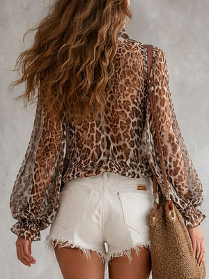 brown blouse featuring tied and leopard