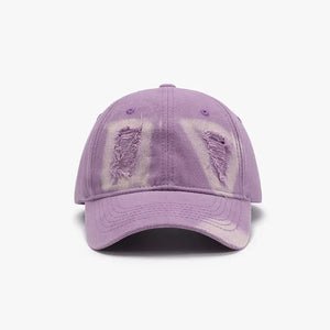 Lilac distressed denim baseball cap with ripped patches and light bleaching.