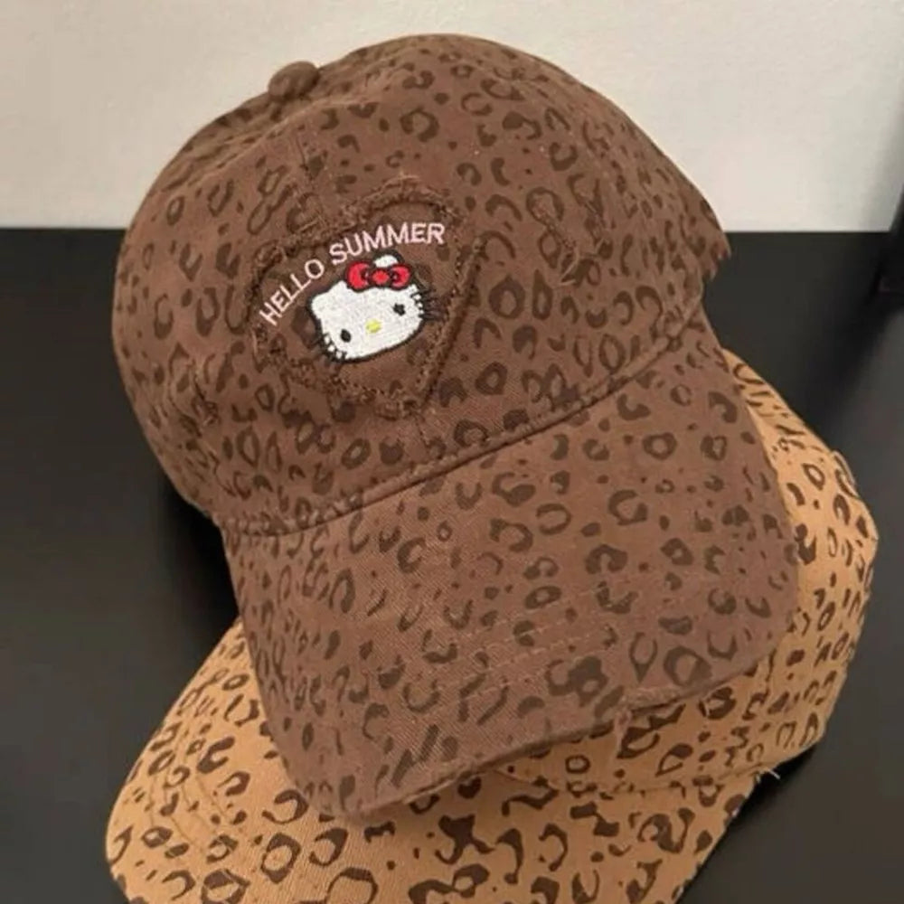 Brown leopard print baseball hat with Hello Kitty "Hello Summer" patch.