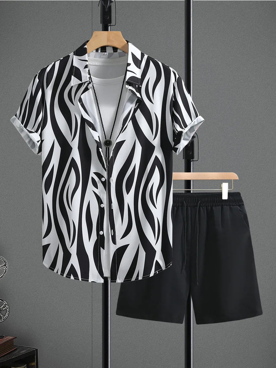 Black and white zebra print short sleeve button-up shirt with black drawstring shorts.