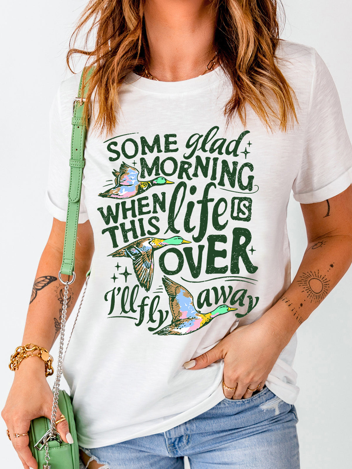 white t-shirt with graphic print and crew neck
