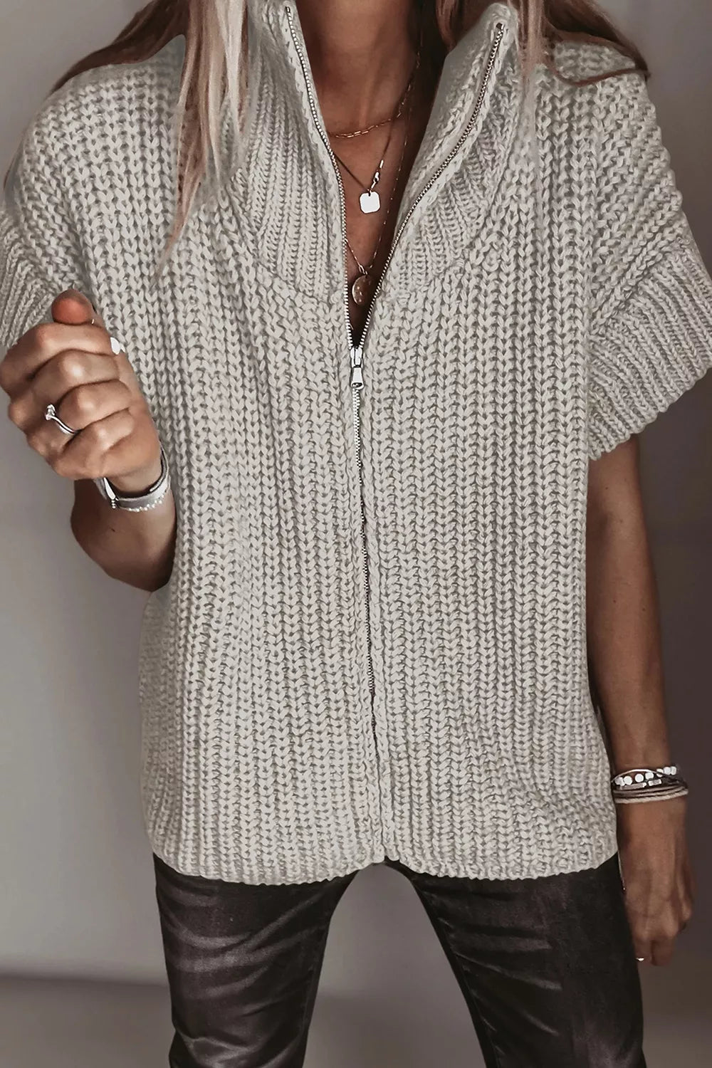 zip-up sweater in oatmeal featuring zipper and regular fit