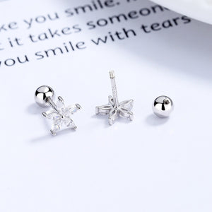 Silver flower stud earrings with clear cubic zirconia, 925 sterling.