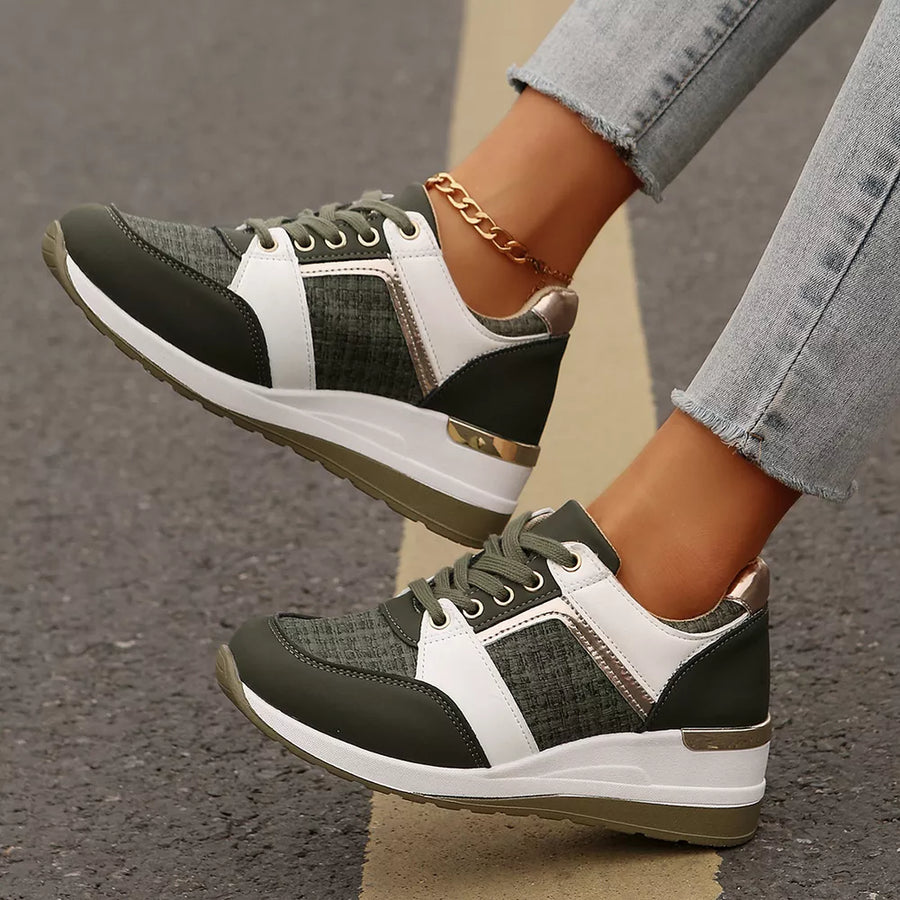 Textured lace-up sneakers in army green with white and metallic accents and a chunky sole.