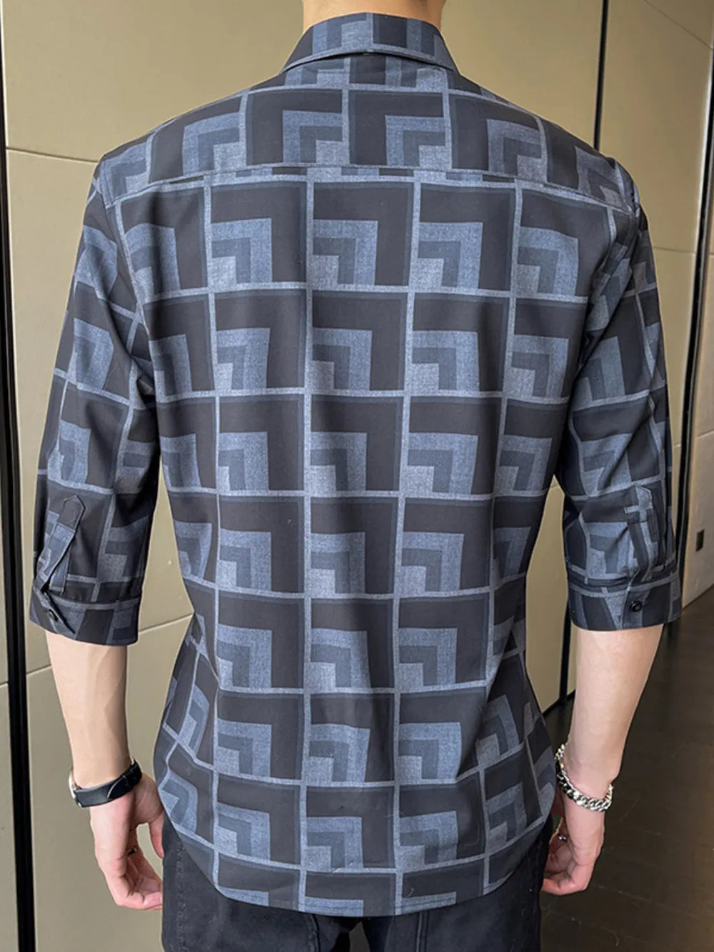 Men's button-up shirt with geometric print in dark blue and grey, cotton blend, 3/4 sleeves.