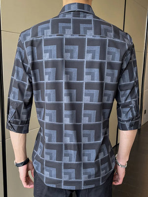 Men's button-up shirt with geometric print in dark blue and grey, cotton blend, 3/4 sleeves.