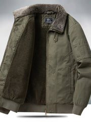 Men's military green bomber jacket with plush sherpa lining and collar detail.