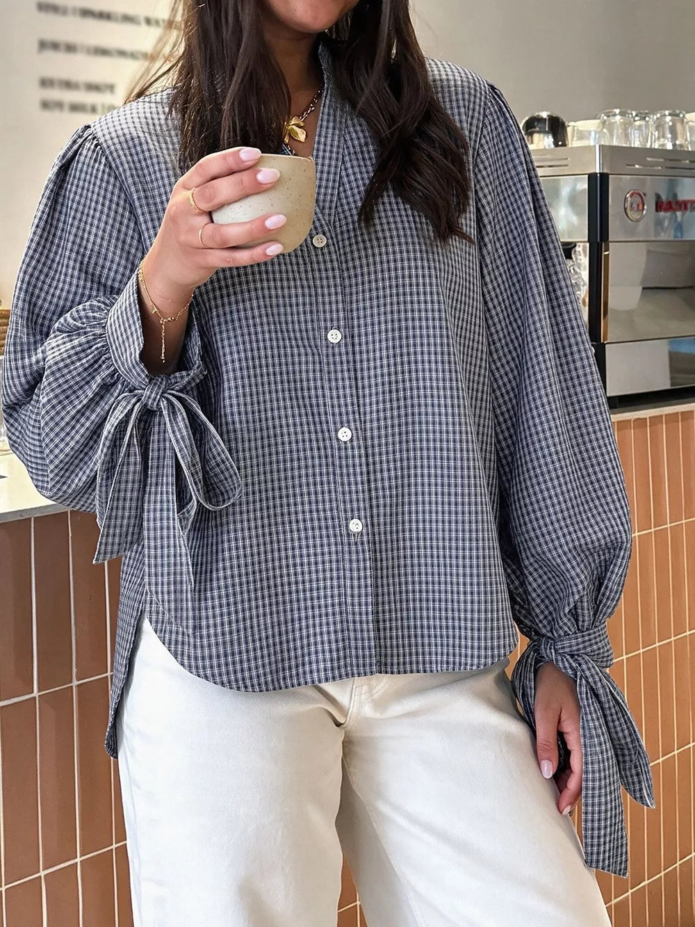 navy blue button-up shirt with gingham and collared