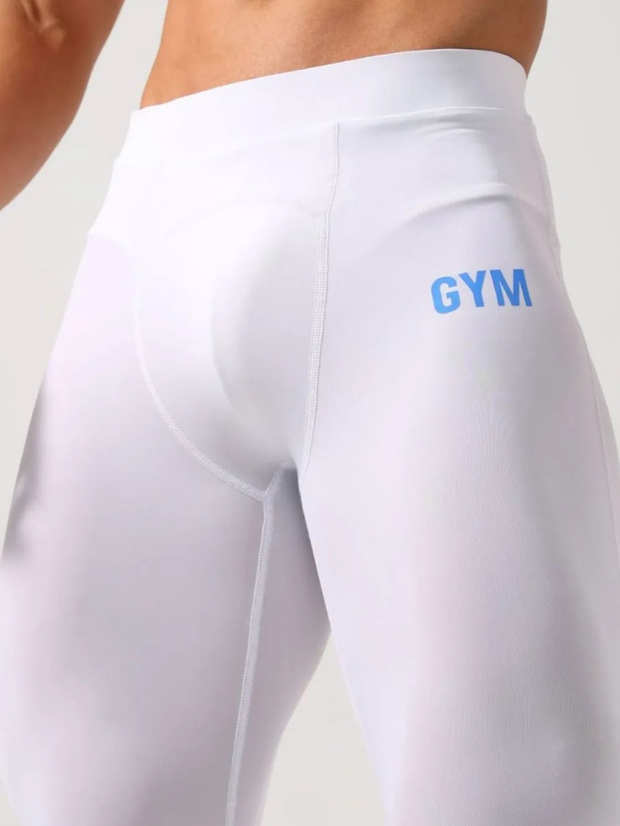 White compression capri leggings with blue GYM logo detail