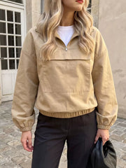 khaki windbreaker with hip-length and quarter-zip